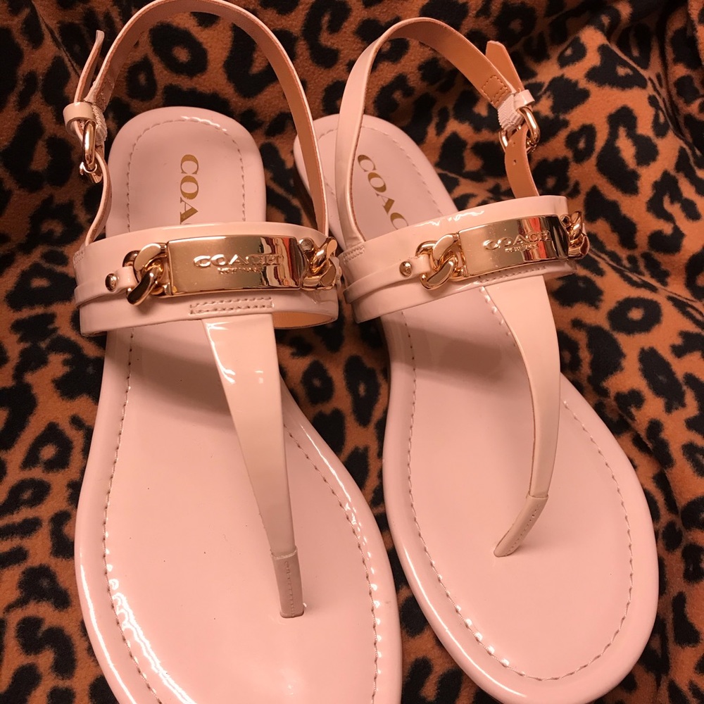 COACH-Flat cream color W/straps. Brand New
